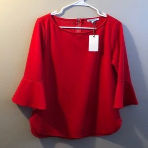 Bell sleeved top